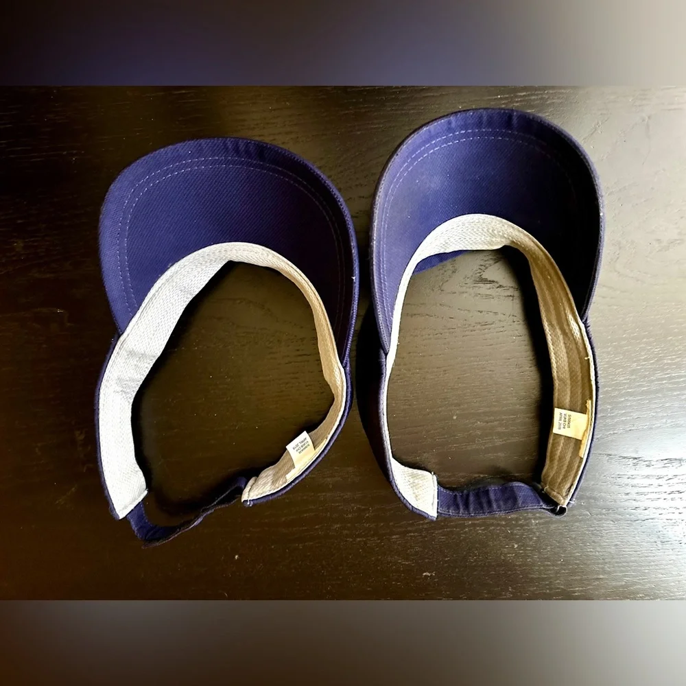 2 New Balance navy blue visors